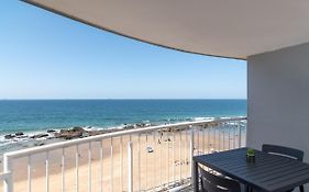 Comfy Beachfront Apt! Shared Pool!